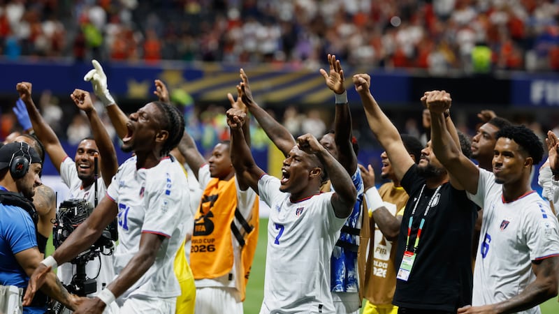 Cape Verde players celebrate after the World Cup Group H soccer match between Spain and Cape...