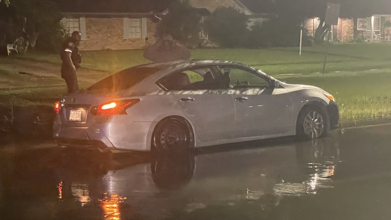 BRFD rescues 3 people from car stuck in water