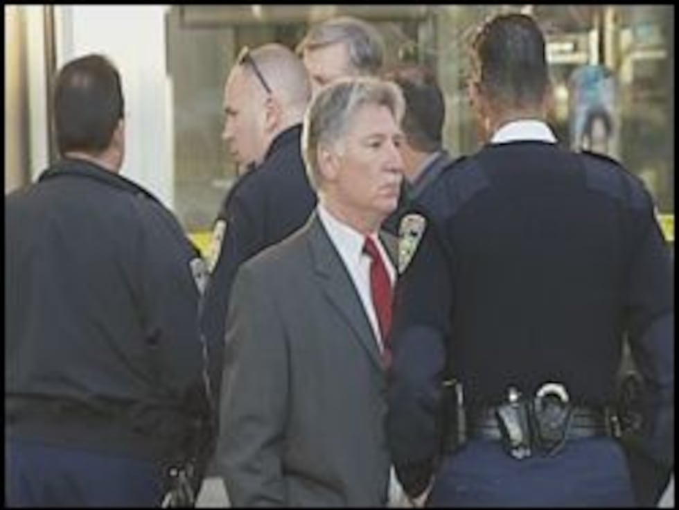 District Attorney Hillar Moore speaks with Police Chief Jeff LeDuff at scene