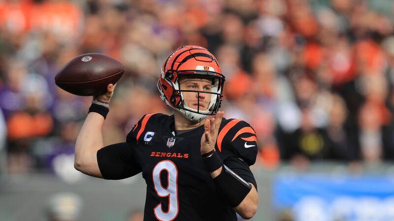 Cincinnati Bengals quarterback Joe Burrow (9) throws during the first half of an NFL football...