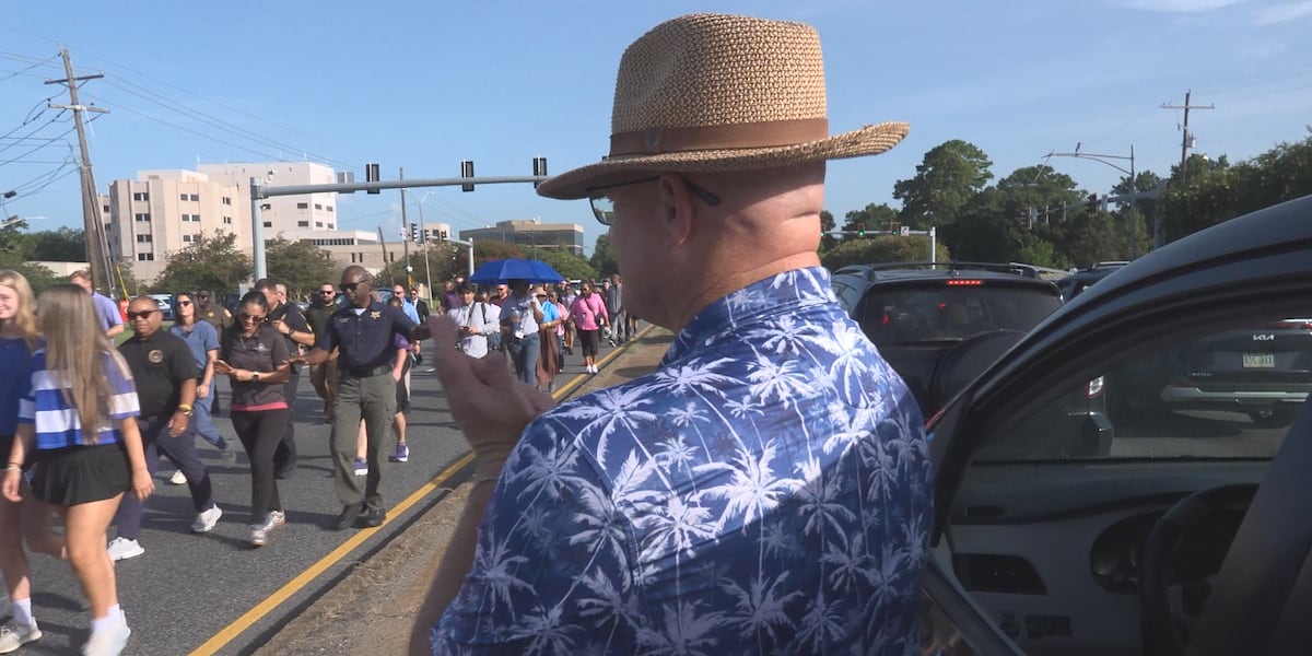 Baton Rouge officers march to B-Quik to honor fallen colleagues killed 10 years ago