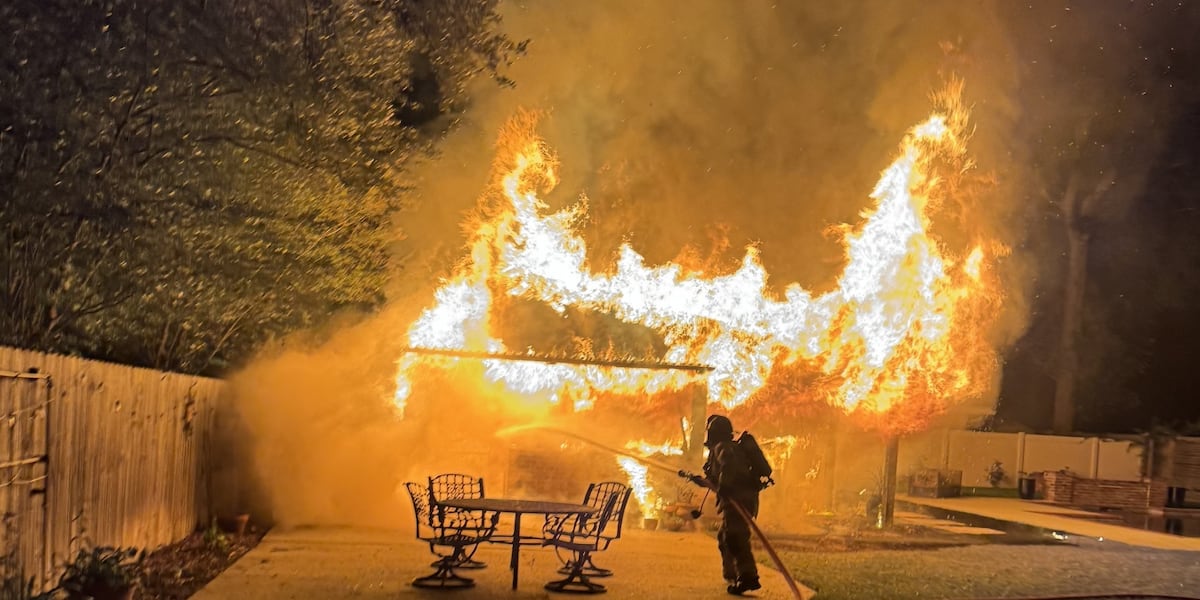 Firefighters battle massive flames from overnight fire