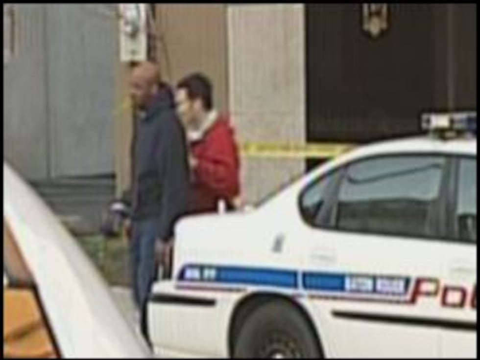 Tate's estranged husband, with detective at scene Friday