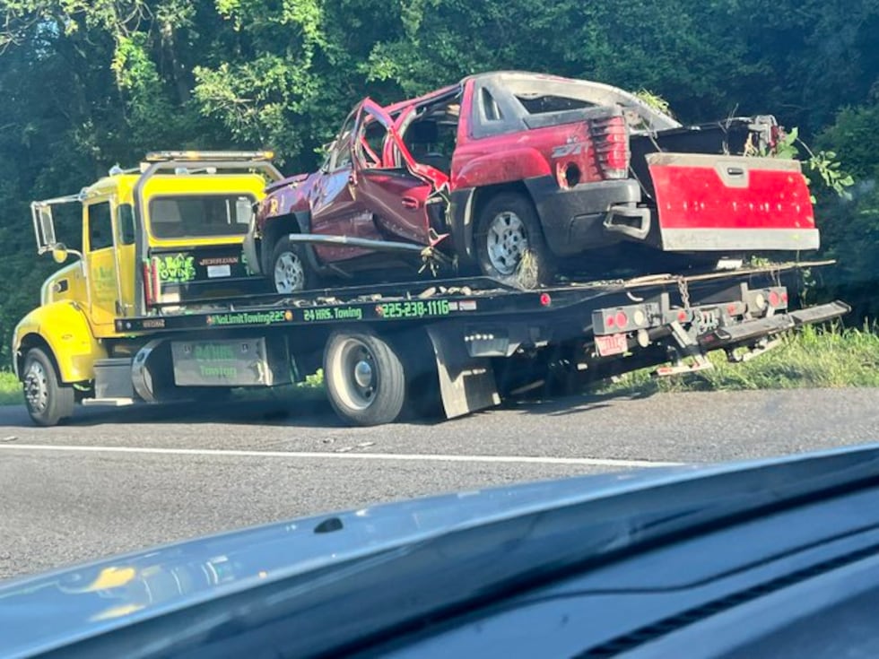 Photos show the aftermath of a crash on I-10 West before Grosse Tete on Friday morning, Aug. 2.