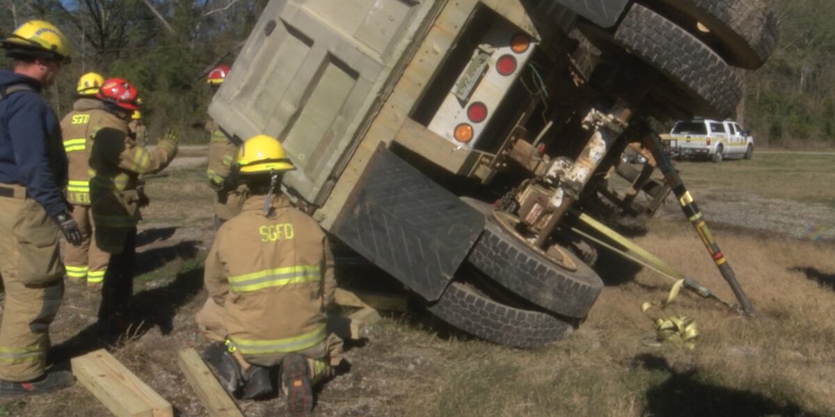 St. George firefighters learning techniques for lifting heavy vehicles St. George firefighters learning techniques for lifting heavy vehicles