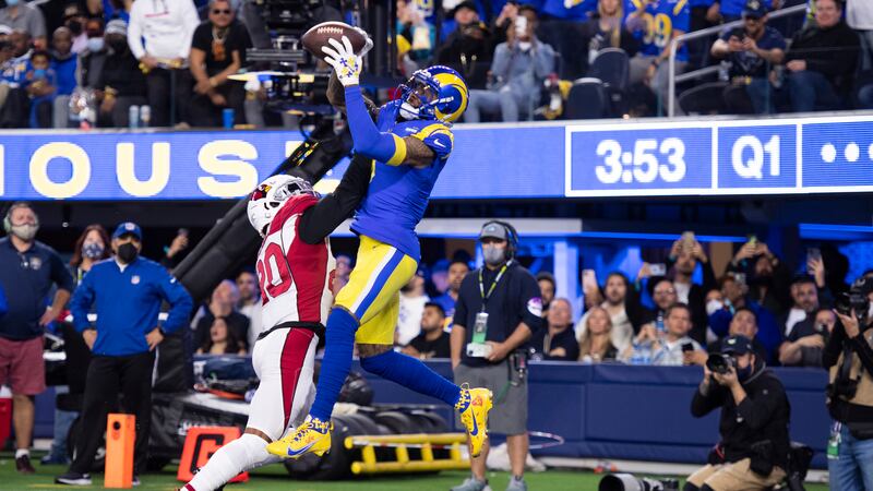 OBJ helps lead Rams in rout over Cardinals in wildcard round