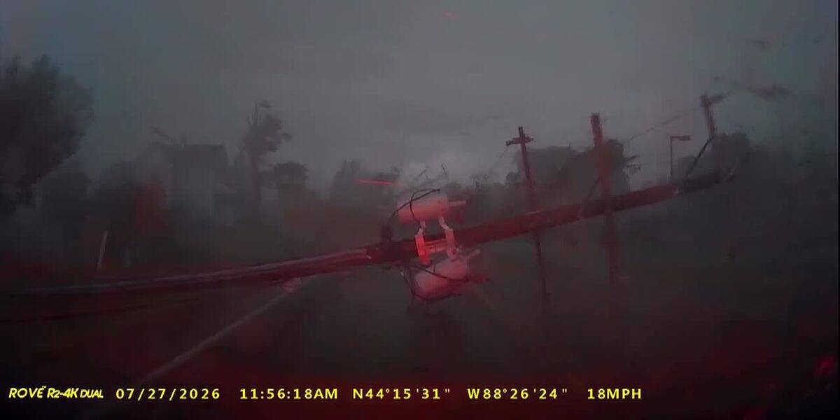 Coverage image for: VIDEO: Driver gets caught between downed power lines as tornado rages